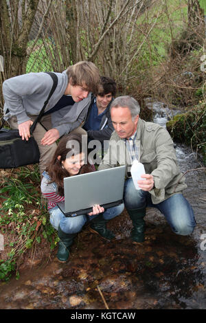 Teenagers in environmental professional training Stock Photo