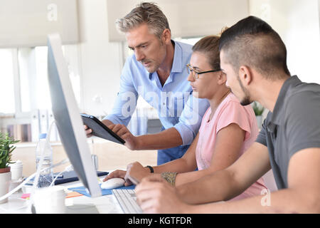 Students in design training course using tablet Stock Photo