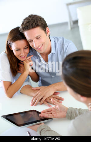 Young couple meeting financial adviser Stock Photo
