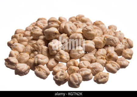 Cicer arietinum is scientific name of Chickpeas legume. Also known as Garbanzo bean, Chick Peas or Grao de Bico. Pile of grains, isolated white backgr Stock Photo