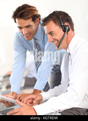 Business people working in call center Stock Photo
