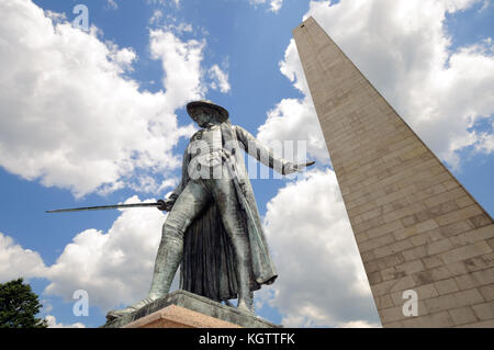 Bunker Hill Monument in Boston, Massachusetts. Granite obelisk and bronze statue of Colonel William Prescott, who commanded the patriot forces here on Stock Photo