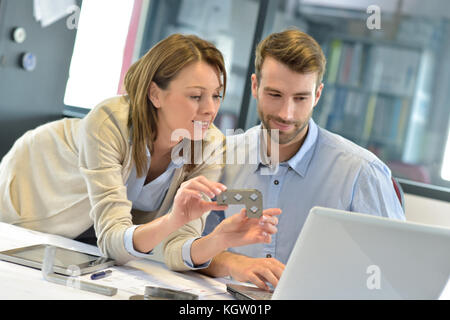 Engineers in industrial sector working in office Stock Photo