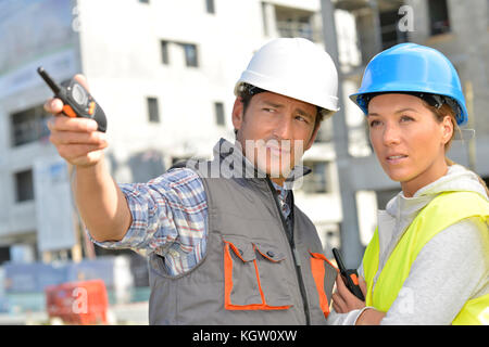 Construction team on building site Stock Photo