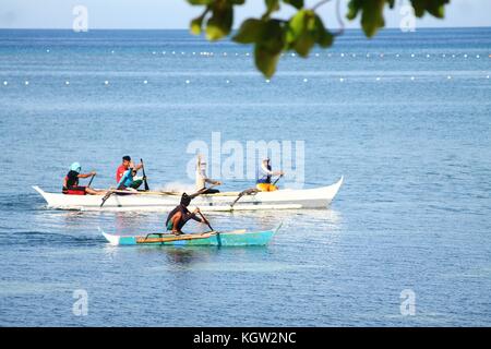 Banka, traditional filipino fishing boat at sunset, Cebu island, The ...