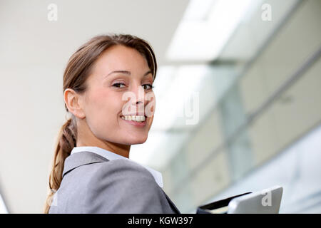 Portrait of beautiful businesswoman standing outside building Stock Photo
