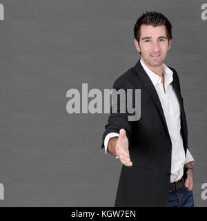 Salesman giving hand for handshake Stock Photo