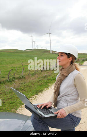 Engineer in wind turbines field using electronic tablet Stock Photo