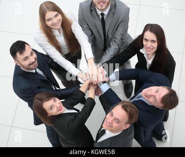 business team formed into a circle Stock Photo