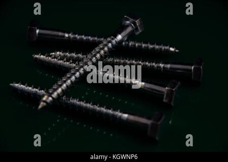 spanner with hexagon head bolt on a dark background Stock Photo