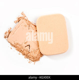 powder and cosmetic sponges on white background Stock Photo
