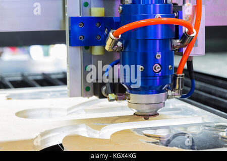 Industrial laser cutting Head ; for cutting steel Plate Stock Photo