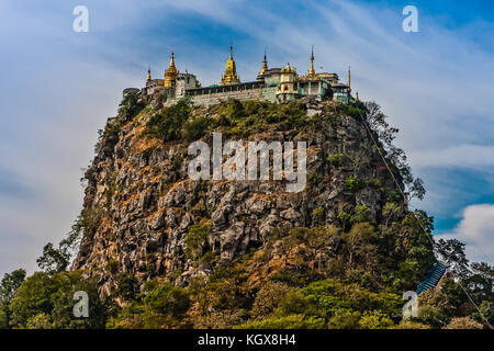Taung Kalat (Pedestal Hill) near Mount Popa, with a Buddhist monastery on the top Stock Photo