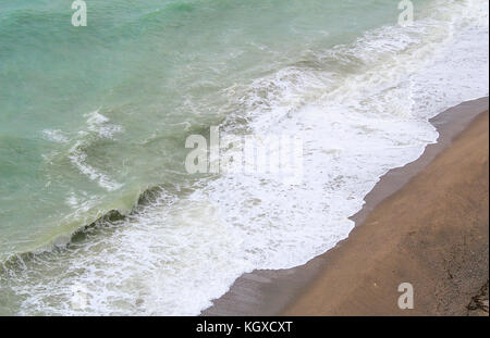 Sea and sand of a beach photographed from above. Stock Photo
