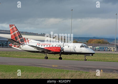 Loganair G-LGNN taxining prior to take off from Inverness Dalcross Airport. in the Scottish Highlands.