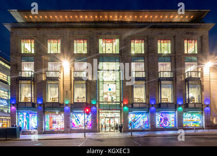 Night view of exterior of Harvey Nichols store in St Andrews Square in Edinburgh, Scotland, United Kingdom. Stock Photo