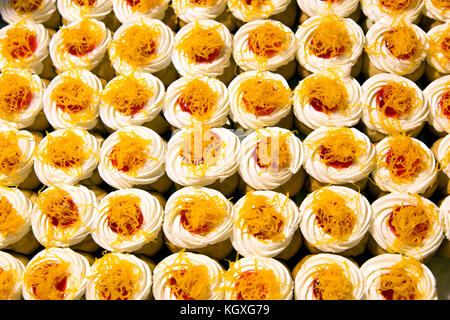 golden Foi-thong cupcakes thai style in bakery shop from top view Stock Photo
