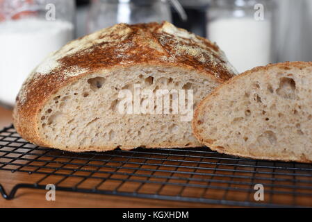 Loaf of Sourdough Bread Cut Open Stock Photo