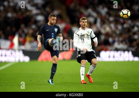 England's Kieran Trippier (left) and Germany's Timo Werner (right) battle for the ball during the International Friendly match at Wembley Stadium, London. PRESS ASSOCIATION Photo. Picture date: Friday November 10, 2017. See PA story soccer England. Photo credit should read: Nick Potts/PA Wire. RESTRICTIONS: Use subject to FA restrictions. Editorial use only. Commercial use only with prior written consent of the FA. No editing except cropping. Stock Photo