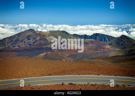 An image of Haleakala National Park taken from the summit at 10,023 feet. This panorama shoes the entire crater with an image of the big island of Haw Stock Photo