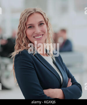 Group of business partners discussing ideas with their leader on foreground Stock Photo