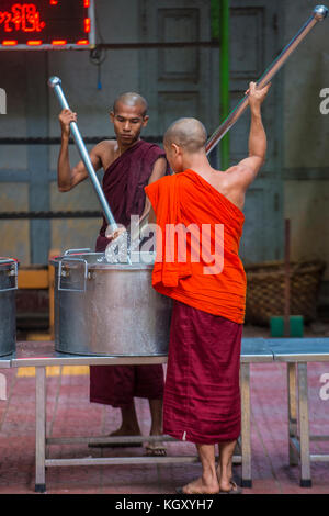 Monks at the Mahagandayon Monastery in Amarapura Stock Photo