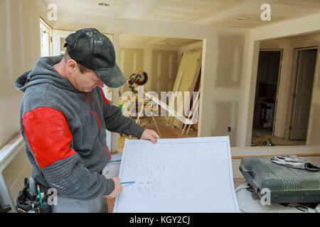 Confident team of architect working together in a office.Then discussing about new startup project on desk. Architect discuss with engineer about proj Stock Photo