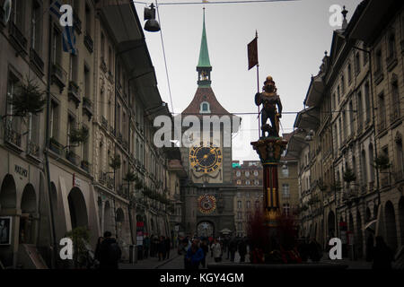 Bern's famous Kramgasse, with Zahringen fountain and the Zytglogge gate tower in the background. Stock Photo