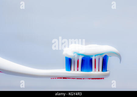 Tooth brush with tooth paste isolated. Stock Photo