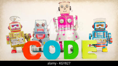 robots and the word CODE Stock Photo