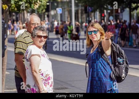 Nice , France 15 August 2017 : Unidentified people speak driving directions in the famous tourist city Stock Photo