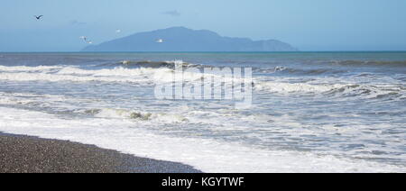 Kapiti Island viewed from Otaki Beach on the Kapiti Coast of New Zealand. Stock Photo
