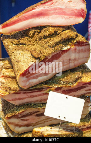 Bacon assortment at the store - with tag Stock Photo