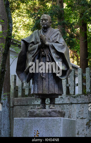 Kyoto, Japan - May 18, 2017: Statue of a praying buddhist monk Stock Photo