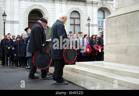 Wreaths are laid during the Western Front Association's annual service of remembrance at the Cenotaph, Whitehall, London. Stock Photo