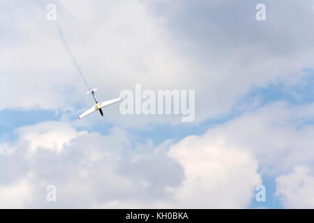 PLASY, CZECH REPUBLIC - APRIL 30: Aerobatic two-seat all-metal Let L-13AC Blanik glider for dual aerobatic training fly on April 30, 2017 in Plasy, Cz Stock Photo