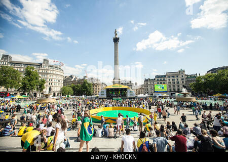 Trafalgar Square is packed with people who attend the ’Brazil Day’ in central London. UK 12/06 2014. Stock Photo