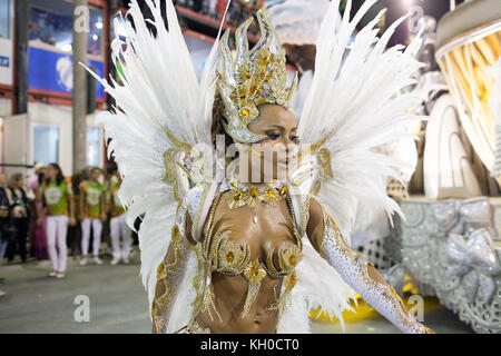 A samba queen and dancer leads the Império de Tijuca samba school’s parade at the Sambodromo at the Rio Carnival 2014. Brazil 03.03.2014. Stock Photo