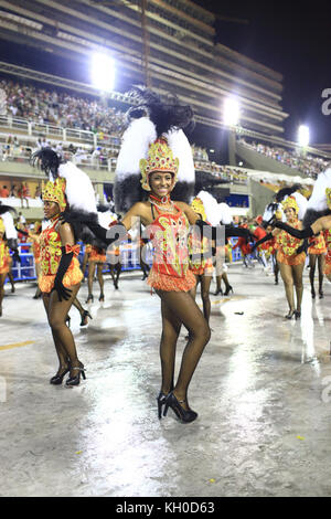 Hundreds of participants dance to the rhythm of carnival beats during the samba school Caprichosos de Pilares’ parade at the Sambodromo at the Rio Carnival 2014. Brazil 02.03 2014. Stock Photo