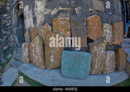 Stone khachkars near famous Sevanavank Monastery at Sevan Lake in Armenia