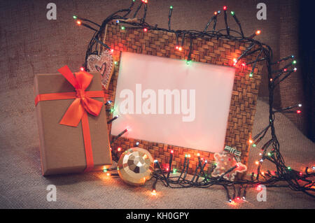 Desktop photo frame and Christmas decorations with gift box Stock Photo