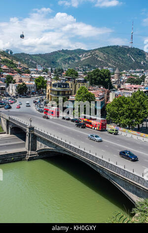 Tbilisi, Georgia, Eastern Europe - view across the Mtkvari River and the Old Town district of the city towards the Tbilisi TV Tower and Mtatsminda. Stock Photo