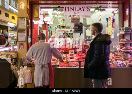 A butcher's stall in Grainger Market, Newcastle upon Tyne Stock Photo