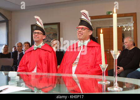 Blankenburg, Germany. 11th Nov, 2017. The gay princely couple Roland I. (R, Roland Vogeley) and Marco I. (Marco Foitzik-Vogeley) tying the knot in the the government offices of the city of Blankenburg, Germany, 11 November 2017. The two men are the first princely couple to have tied the knot ahead of the start of the carnival season after the legalisation of gay marriage in Germany. Credit: Matthias Bein/dpa-Zentralbild/dpa/Alamy Live News Stock Photo