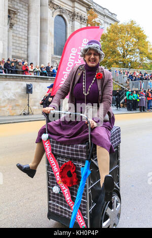 City of London, UK. 11th Nov, 2017. A participant from Welcome to Yorkshire's 'Granny Tourismo' troupe of dancing grannies. The 2017 Lord Mayor's Parade, an 800 year old custom, sees the traditional procession of floats and around 6,500 participants from UK charities, marching bands, military detachments, London corporations and representatives from the City of London trades, guilds and services. The new Mayor, Charles Bowman, leads off the procession in the golden State Coach. Credit: Imageplotter News and Sports/Alamy Live News Stock Photo