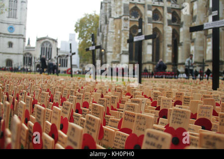 London, UK. 11th Nov, 2017. Thousands of crosses planted at the Fields of Remembrance at Westminster Abbey in London to remember the men and women who have lost their lives in conflict. on November 11, 2017. The first official Armistice Day was subsequently held on November 11, 1919 on the grounds of Buckingham Palace. Credit: david mbiyu/Alamy Live News Stock Photo