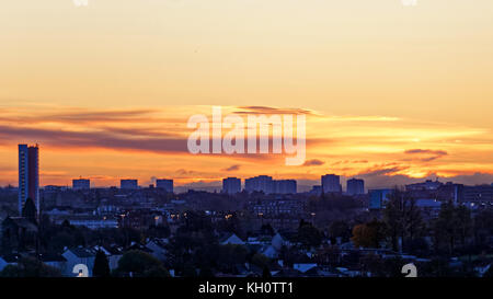 Glasgow, Scotland, UK  12th November. UK Weather Sunny morning ahead as the last of the cloud mushrooms as the sun rises on remembrance sunday. Credit Gerard Ferry/Alamy news Stock Photo
