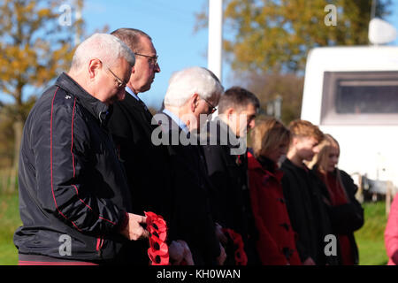 Shobdon airfield, Herefordshire, UK - Sunday 12th November 2017 - Members of the Herefordshire Aero Club pay respect on Remembrance Sunday at the airfield at Shobdon - the airfield was built in WW2 and used by the RAF to train glider assault pilots from the Glider Pilot Regiment in readiness for the invasion of Normandy D-Day and the glider assaults at Arnhem and across the Rhine. Steven May / Alamy Live News Stock Photo