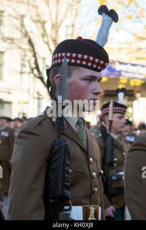 Glasgow, Scotland, UK. 12th November, 2017. A two-minute silence to mark Remembrance Sunday has been observed at 11:00 at the Cenotaph in George Square, Glasgow. In her role as Lord Lieutenant, Lord Provost Eva Bolander led the ceremony, with the Moderator of the Church of Scotland Glasgow Presbytery, Rev. Ian Galloway, leading prayers. Also in attendance amongst serving military, veterans, and the public, was Deputy First Minister John Swinney, representatives of the British Armed Forces, and of Police Scotland and the Scottish Fire and Rescue Service. Iain McGuinness / Alamy Live News Stock Photo