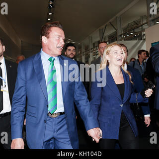 Bonn, Germany. 12th Nov, 2017. Arnold Schwarzenegger, R20 Founding Chair and Governor of California with his girlfriend Heather Milligan at the COP23 Fiji conference in Bonn, Germany on the 12th of November 2017. COP23 if organized by UN Framework Convention for Climate Change. Fiji holds presidency over this meeting in Bonn. Credit: Dominika Zarzycka/Alamy Live News Stock Photo